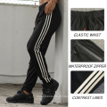 Calça de secagem rápida calça de ginástica masculina Treino de calças de ginástica executando calças de moletom listradas com bolsos com zíper